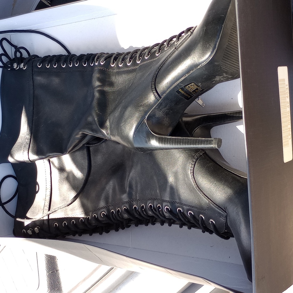 Black up the leg high heel boots